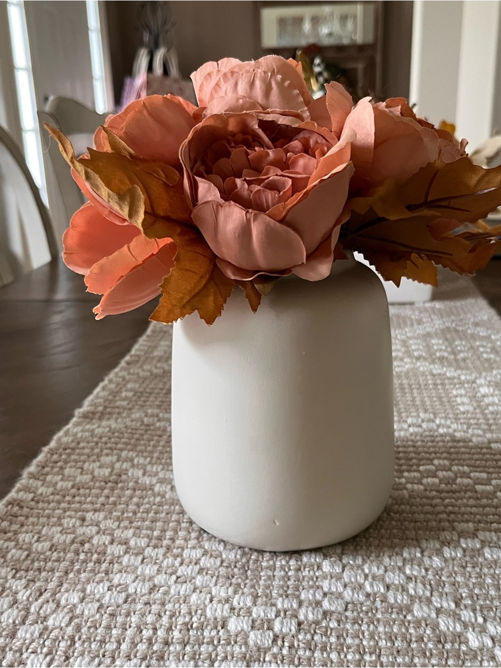 Coral Floral Arrangement in Cream Vase